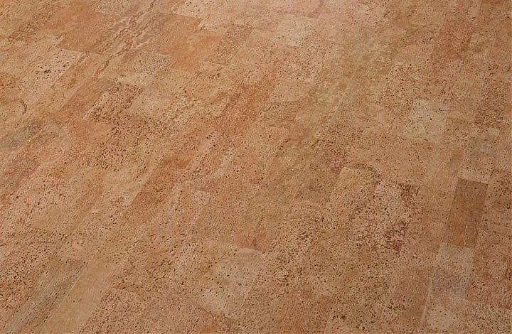 To achieve an overall 3/4" thickness above a radiant slab, can I add a cork underlayment?